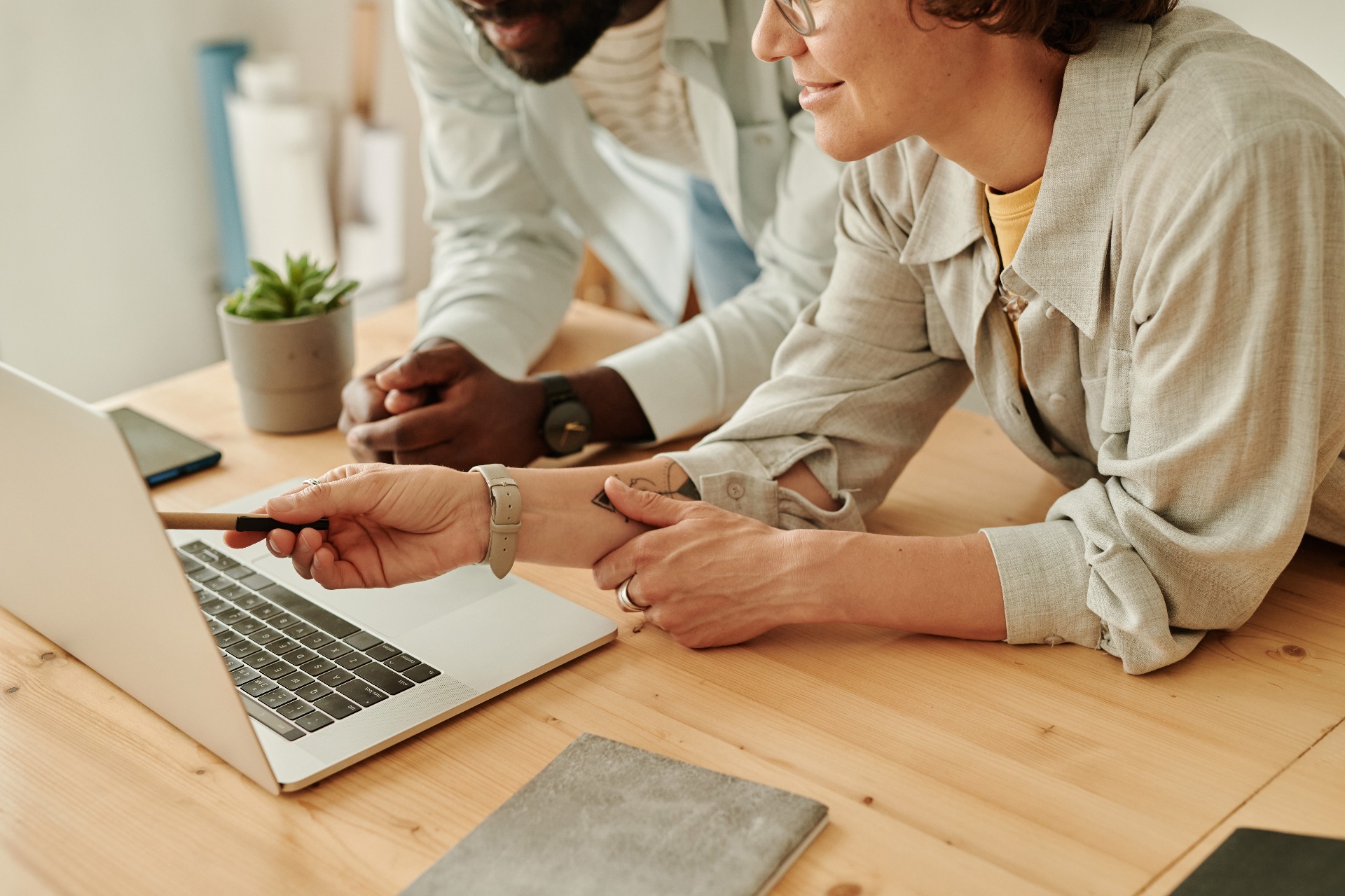 Two Digital Marketing Experts Working On Email Marketing Campaign for HVAC Company